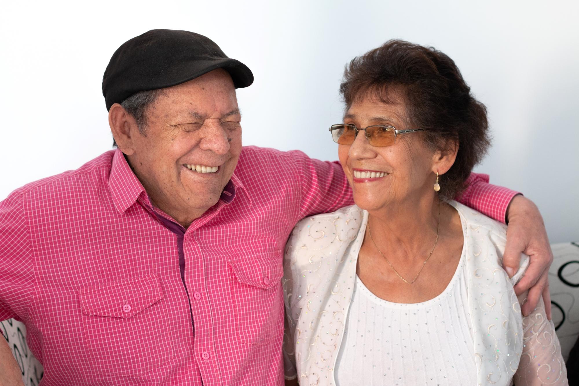 Senior man and woman laughing